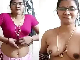 Indian wife reveals her curves in a revealing photo shoot